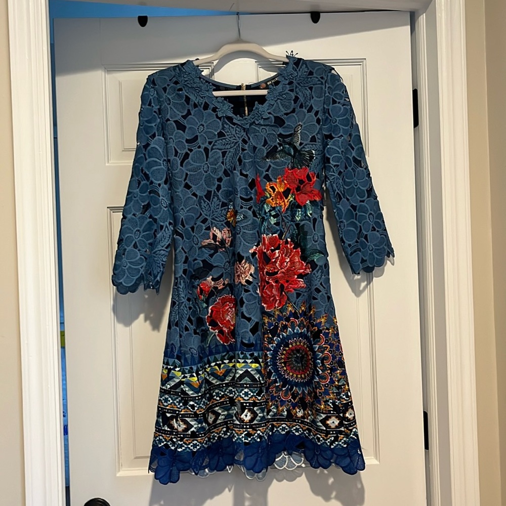 Super chic and elegant spring dress. Lace, flowers, light material.